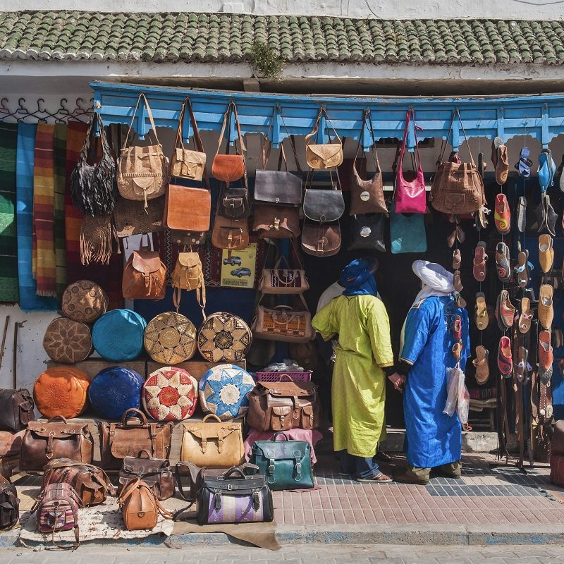 Berber men shopping, Essaouira, formerly Mogador, UNESCO World Heritage Site, Morocco, Africa